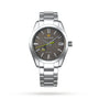 The Grand Seiko Spring Drive Heritage is a stainless steel wristwatch with Japanese craftsmanship, a grey textured dial, yellow second hand, date window at 3 o’clock, and silver bracelet, shown on a white background.