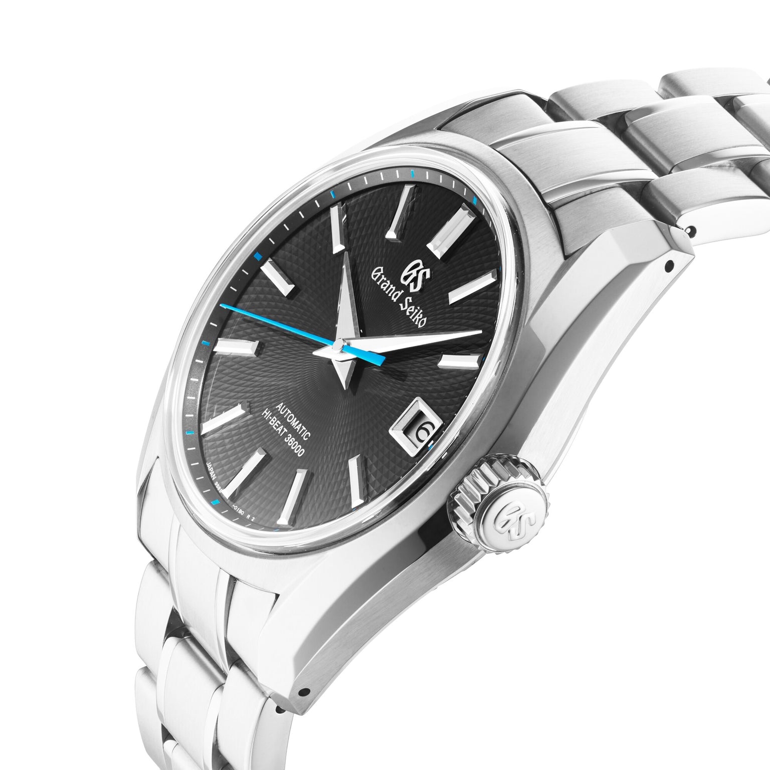 The Grand Seiko Hi-Beat Heritage is a stainless steel limited edition inspired by Jodogahama beach, featuring a black textured dial, blue seconds hand, silver hour markers, and a date window at 3 oclock—a true masterpiece.