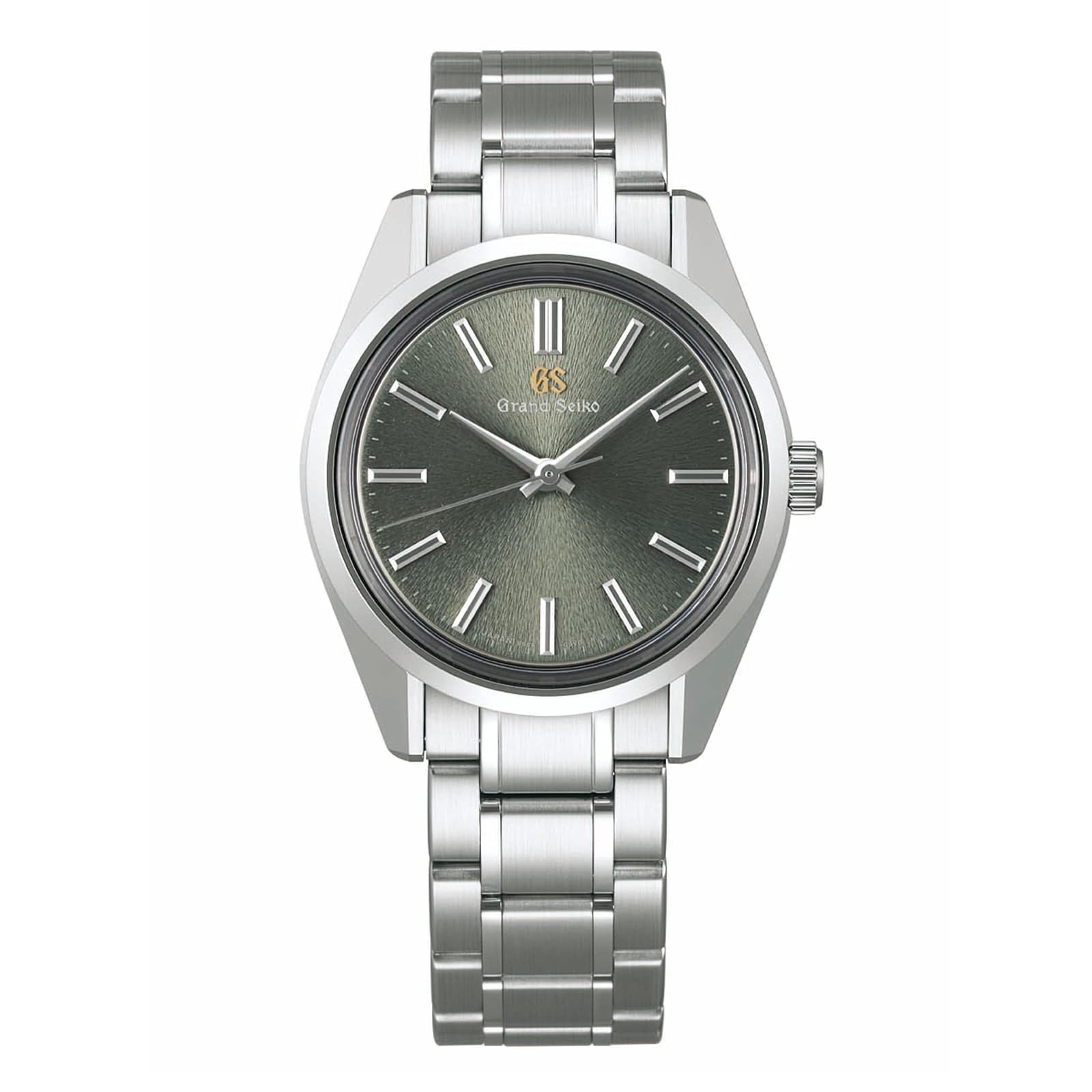 The Grand Seiko Manual Heritage wristwatch features a textured gray dial, silver hour markers, and a sleek metal bracelet, showcasing exquisite craftsmanship from the Heritage Collection.