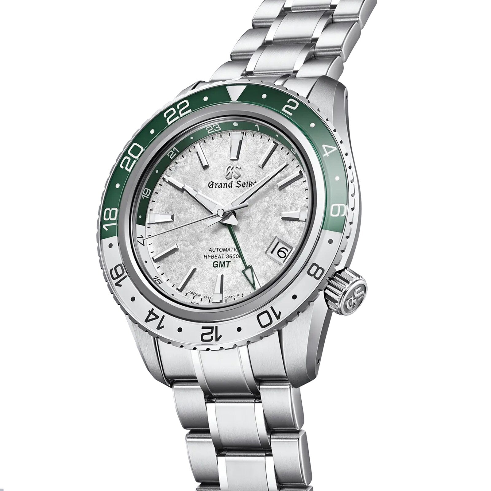 The Grand Seiko Hi-Beat GMT Sport is a stainless steel wristwatch with a green and white GMT bezel, silver textured dial with GMT functionality, date at 3 oclock, and a robust metal bracelet.