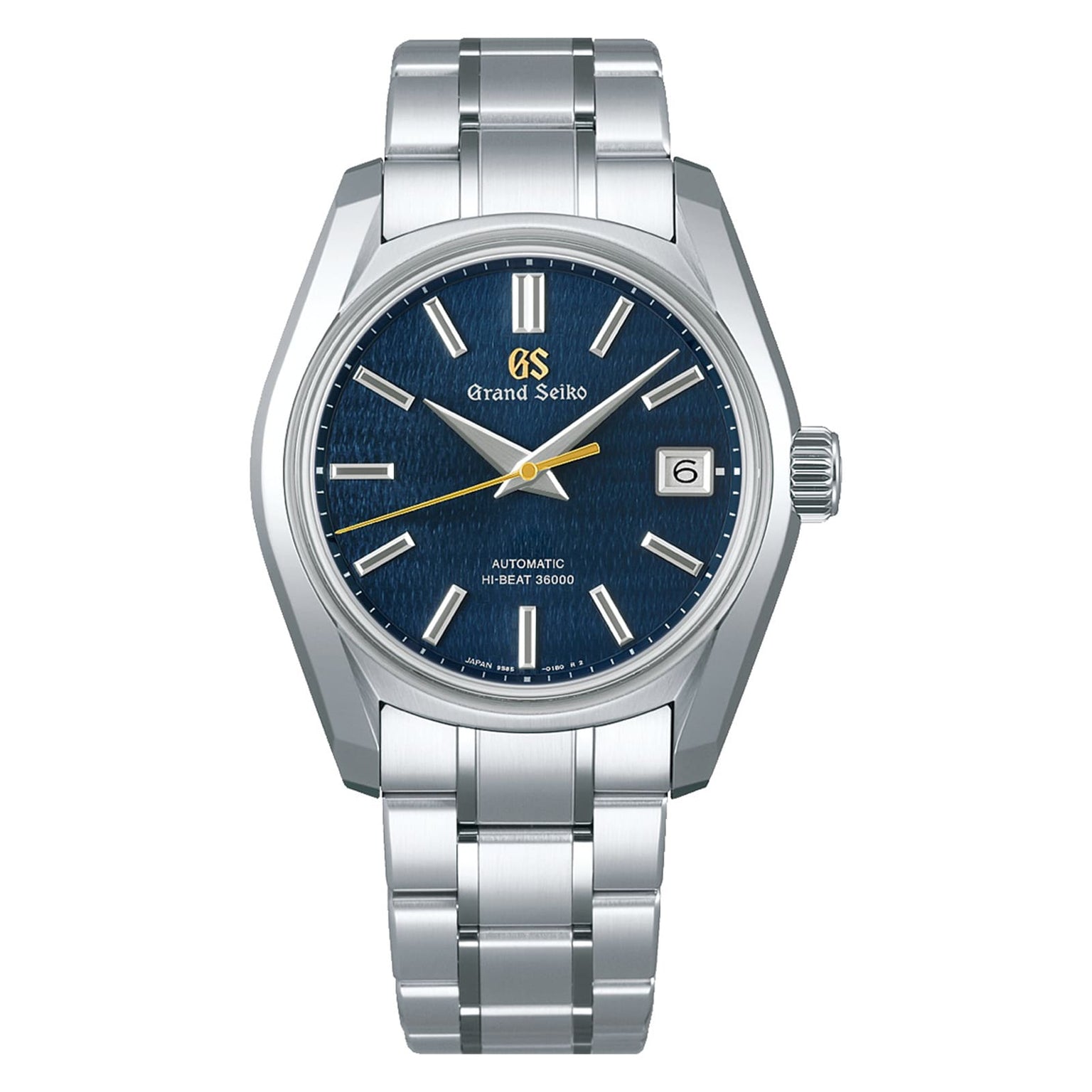 The Grand Seiko Hi-Beat Heritage is a stainless steel wristwatch with Zaratsu polishing, a blue textured dial, silver hour markers, date display at 3 o’clock, and a metal bracelet.