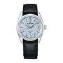 The Grand Seiko Spring Drive U.F.A Evolution 9 features a textured light blue dial, silver markers, and a black leather strap.