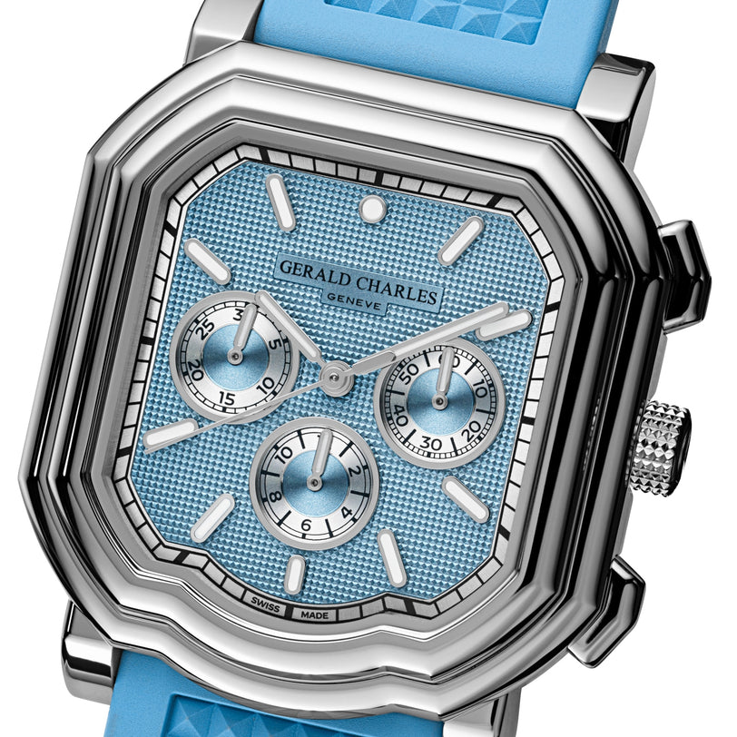 Close-up of the Gerald Charles Maestro 3.0 Chronograph Clou de Paris, a silver watch with a blue face and strap, featuring three subdials.