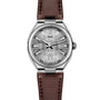 ID Geneve Circular S - Silver Brushed: a silver analog wristwatch with a brown leather strap and a patterned dial that displays the date.