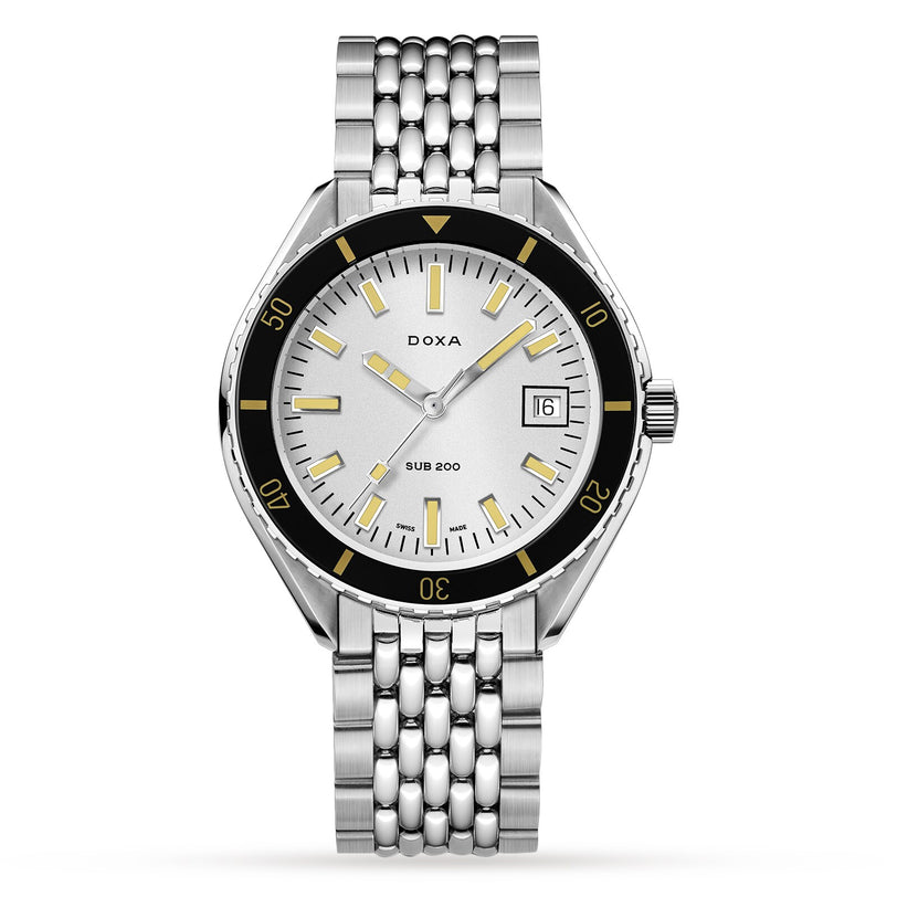 The DOXA Sub 200 Searambler is a stainless steel diver’s watch with a silver dial, rotating bezel, yellow hour markers, date window at 3 o’clock, and metal bracelet.