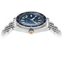 The DOXA Sub 200 Caribbean, a 316L stainless steel diver’s watch with a blue dial, yellow markers, and silver link bracelet, is shot from a low side angle to highlight its unidirectional rotating bezel.