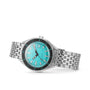 The DOXA Sub 200 Aquamarine, a 316L stainless steel divers watch with a turquoise face, unidirectional rotating bezel, date display, and silver link bracelet, is displayed against a white background.