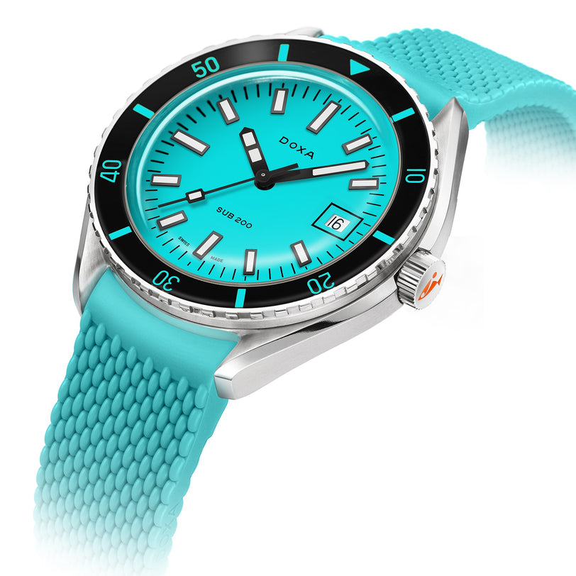 The DOXA Sub 200 Aquamarine is a divers watch with an aquamarine dial and rubber strap, black bezel, stainless steel case, white hour markers, and a date display at 3 oclock.
