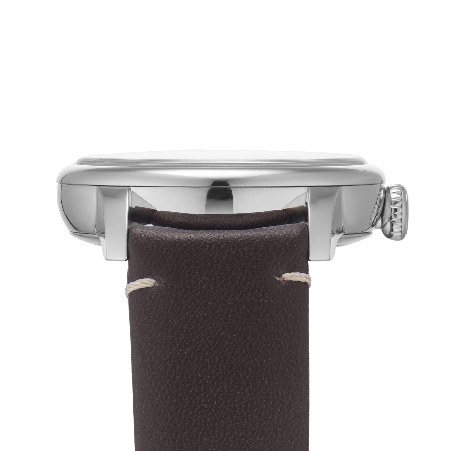 Side view of Louis Erard Petite Seconde Terracotta 42, a silver wristwatch featuring a brown leather strap and visible crown.