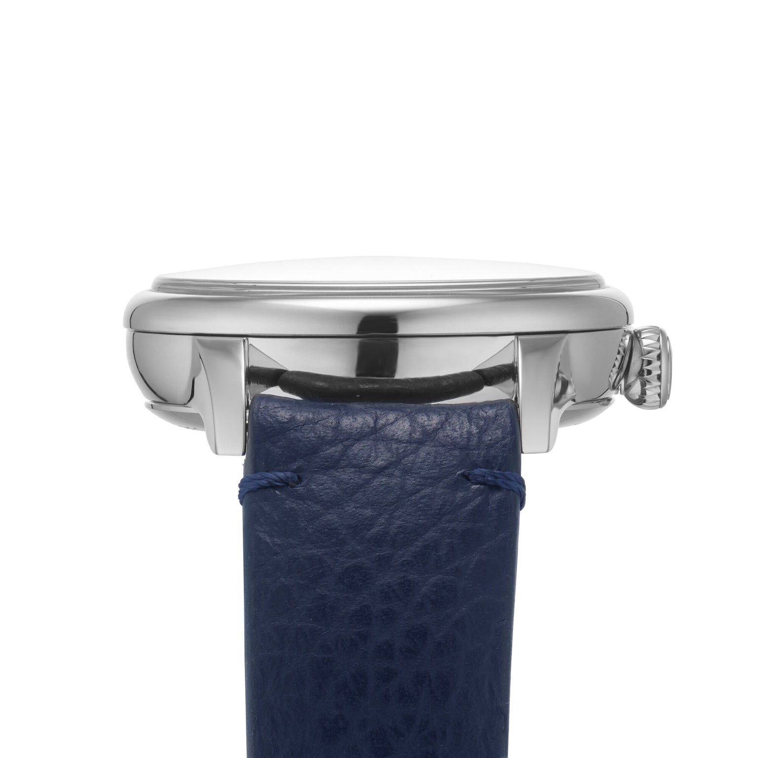 Side view of the Louis Erard Petite Seconde Bleu Nuit, a silver wristwatch with a blue leather strap, set against a white background.