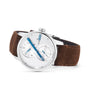 Louis Erard Le Régulateur Louis Erard x seconde/seconde/ wristwatch with a white dial, blue hands, and a brown suede strap shown on a white background.