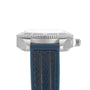 Side view of William Woods Valiant Collection - The Blue Watch, featuring a silver case, ridged bezel, and blue textured strap.