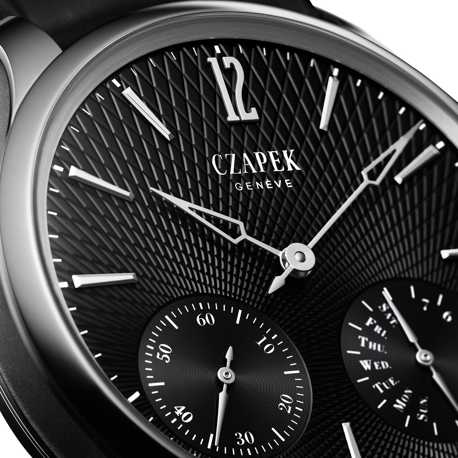 Close-up of the Czapek Quai des Bergues N°17 Double Soleil Tuxedo Black luxury watch, featuring a textured black dial and silver hour markers.