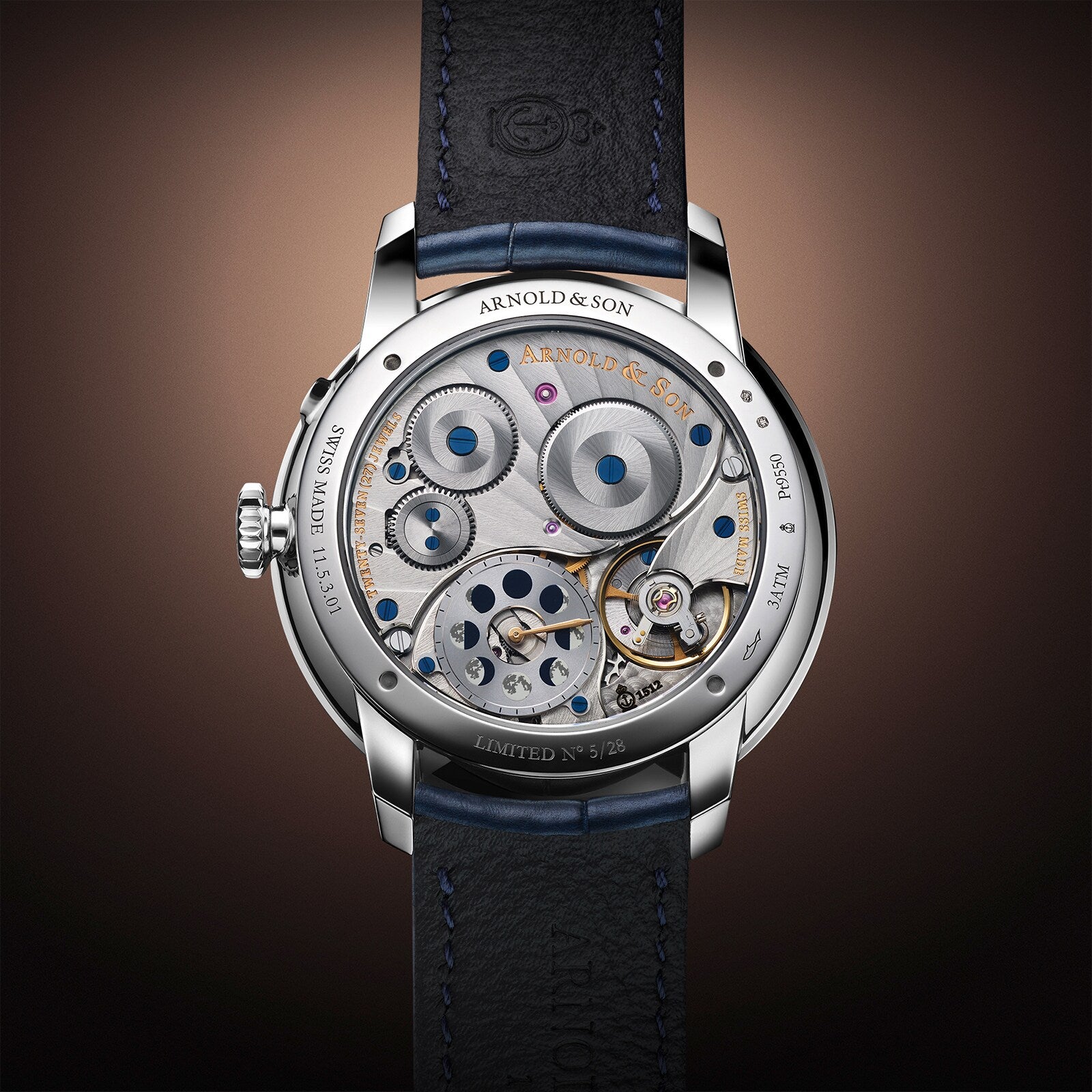 Close-up of the Arnold & Son Perpetual Moon 41.5mm Platinum showcasing its exposed mechanical movement, intricate gears, and elegant leather strap.