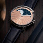 The Arnold & Son Perpetual Moon 41.5mm Platinum is a luxury wristwatch with a moonphase dial, star design, platinum case, and black leather strap.