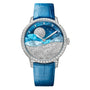 The Arnold & Son Perpetual Moon 38 White Gold Mintnight is a luxury watch with a blue strap, diamond bezel, and a celestial-themed face featuring stars and waves.