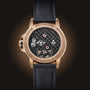 Angelus Gold & Carbon Flying Tourbillon limited edition watch with visible mechanical movement and black leather strap, displayed from the back.