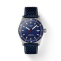 Tissot watch with blue strap and face on a white background