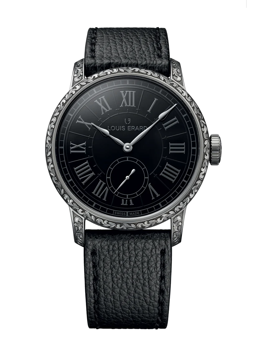 Black watch with detailed case and black leather strap on a white background