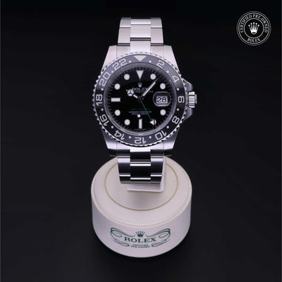 Rolex Certified Pre-owned GMT M116710LN-0001 front on black background