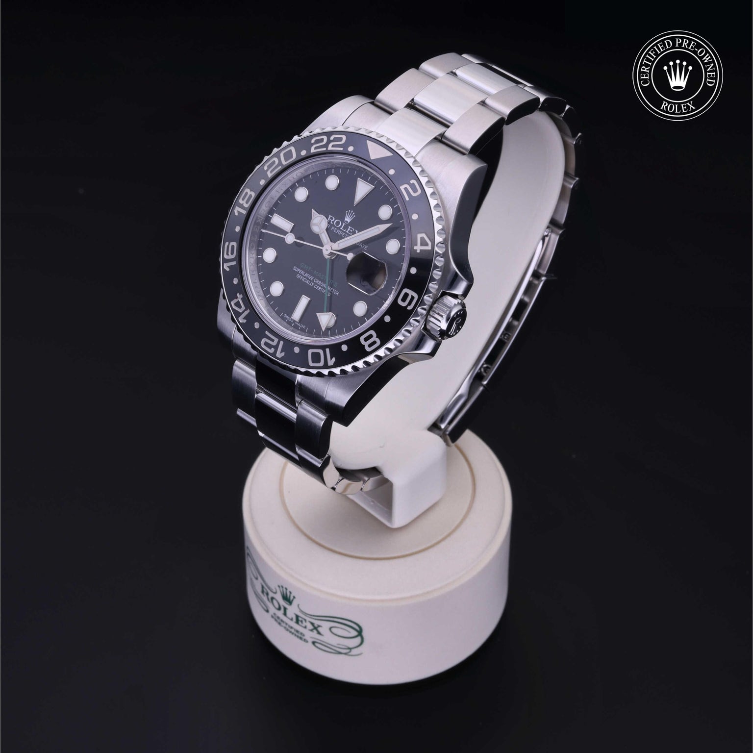 Rolex Certified Pre-owned GMT M116710LN-0001 front on black background