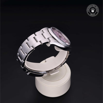 Rolex Certified Pre-owned Oyster Perpetual M126000-0008 front on black background