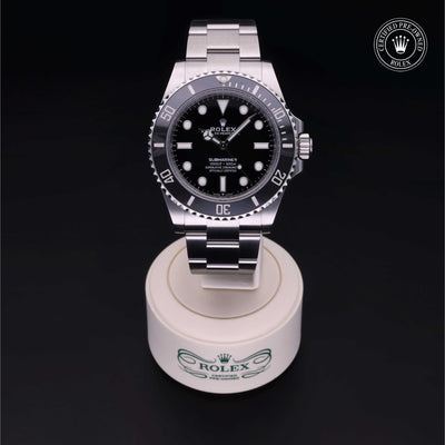 Rolex Certified Pre-owned Submariner M124060-0001 front on black background