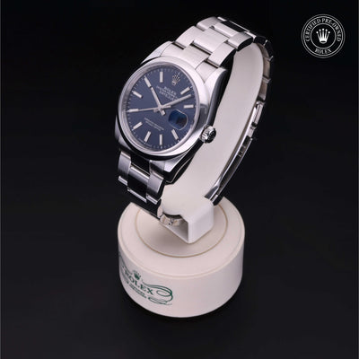 Rolex Certified Pre-owned Datejust M126200-0006 front on black background