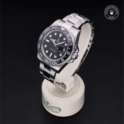 Rolex Certified Pre-owned GMT M116710LN-0001 front on black background