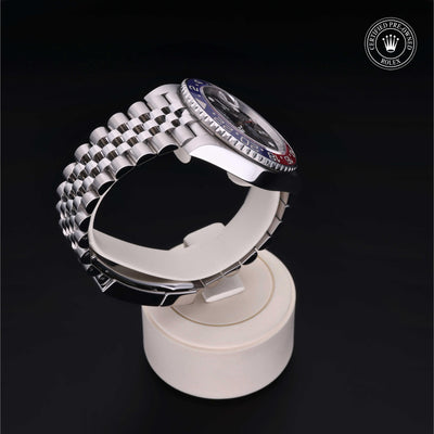 Rolex Certified Pre-owned GMT II M126710BLRO-0001 front on black background