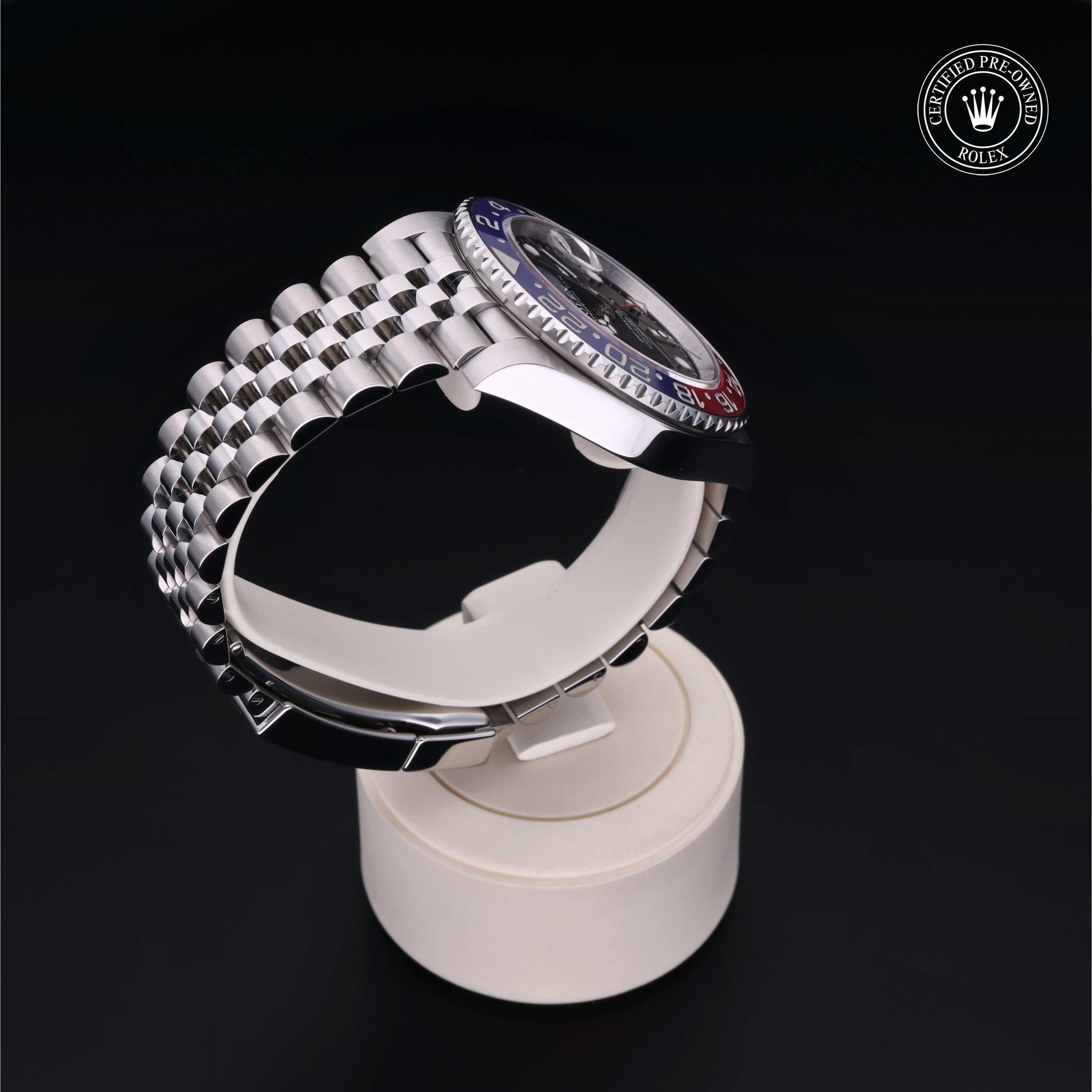 Rolex Certified Pre-owned GMT II M126710BLRO-0001 front on black background