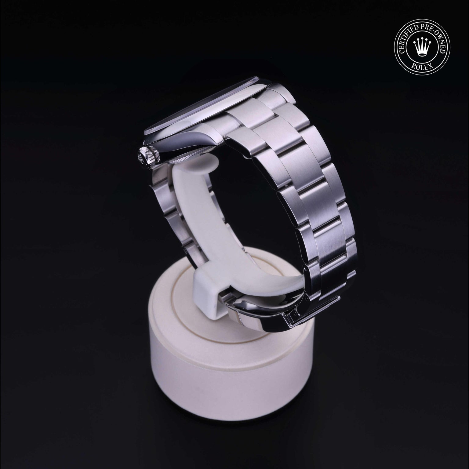 Rolex Certified Pre-owned Oyster Perpetual M124300-0005 front on black background