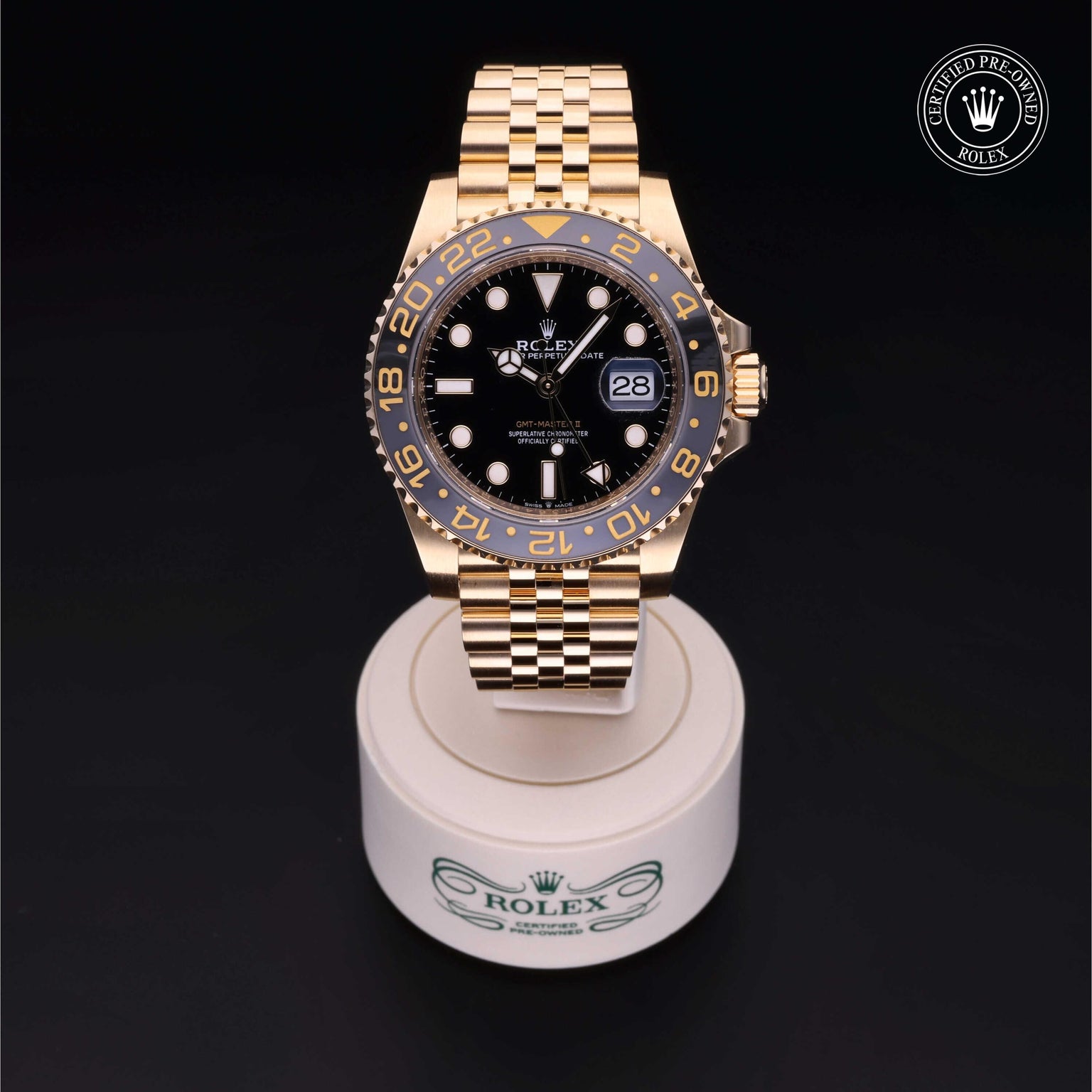 Rolex Certified Pre-owned GMT M126718GRNR-0001 front on black background