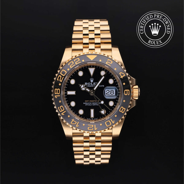 Rolex Certified Pre-owned GMT II M126718GRNR-0001 front on black background