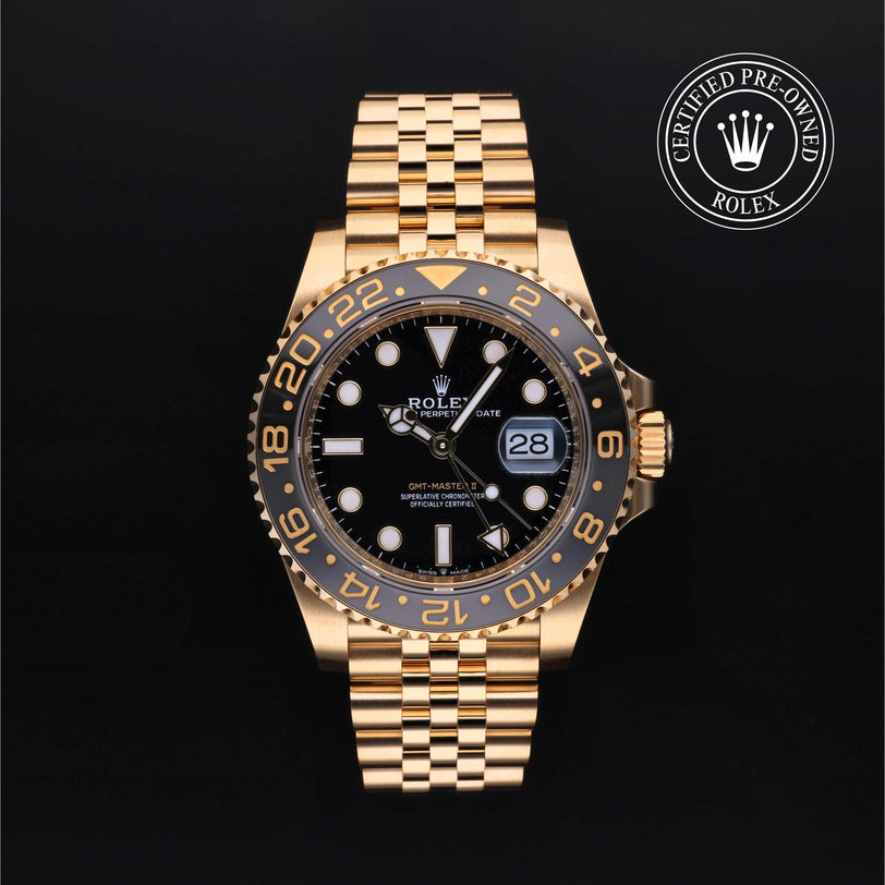 Rolex Certified Pre-owned GMT II M126718GRNR-0001 front on black background