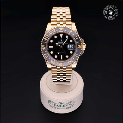 Rolex Certified Pre-owned GMT II M126718GRNR-0001 front on black background