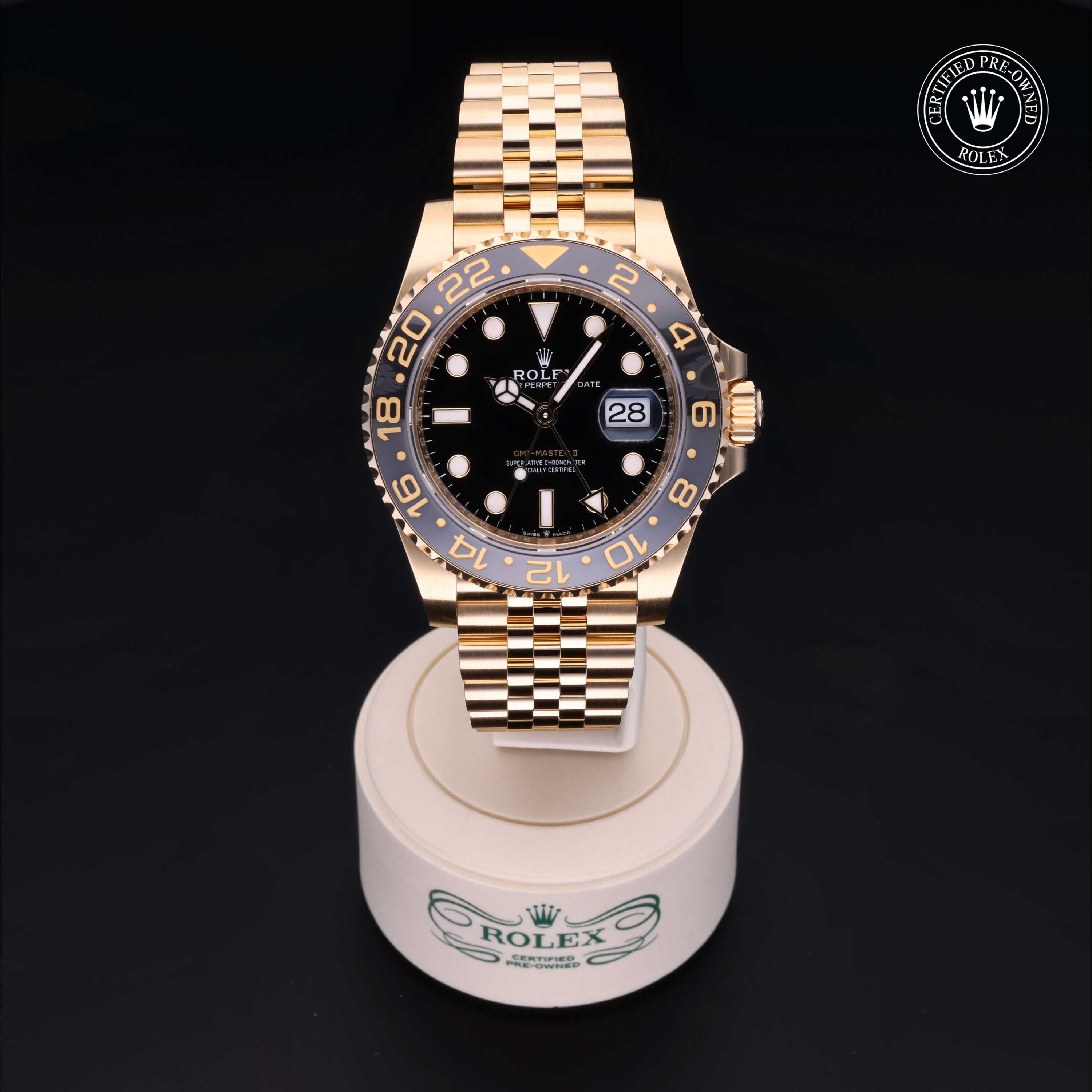 Rolex Certified Pre-owned GMT II M126718GRNR-0001 front on black background