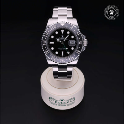 Rolex Certified Pre-owned GMT M116710LN-0001 front on black background