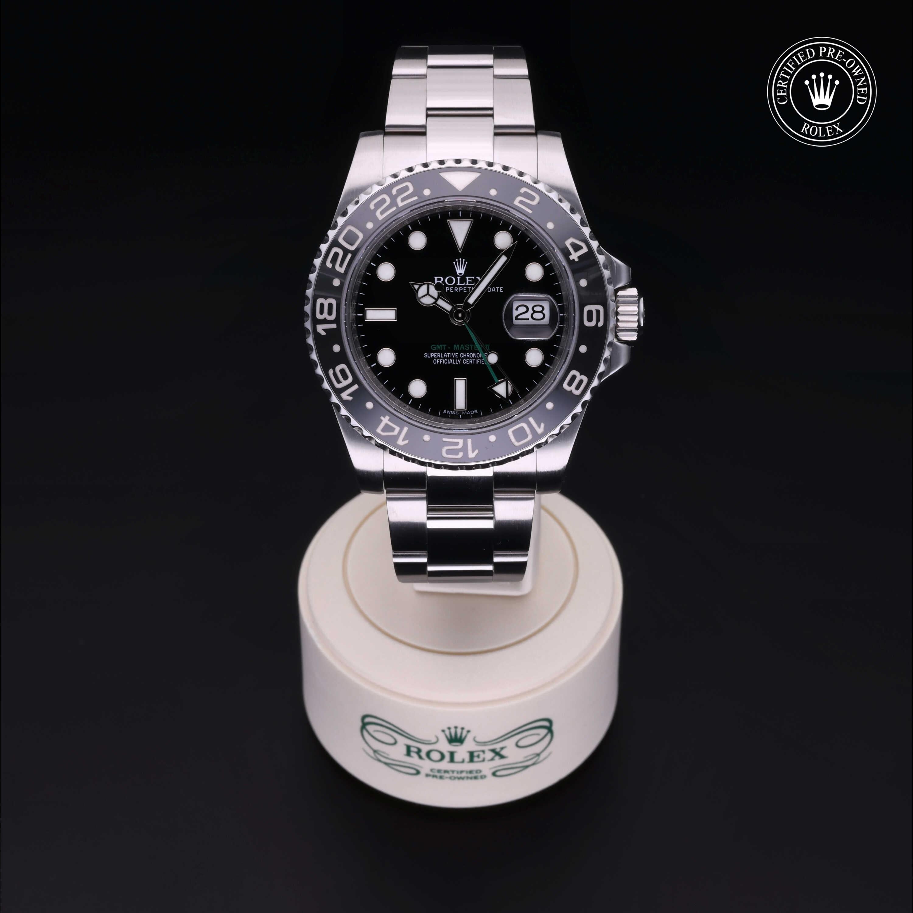 Rolex Certified Pre-owned GMT M116710LN-0001 front on black background