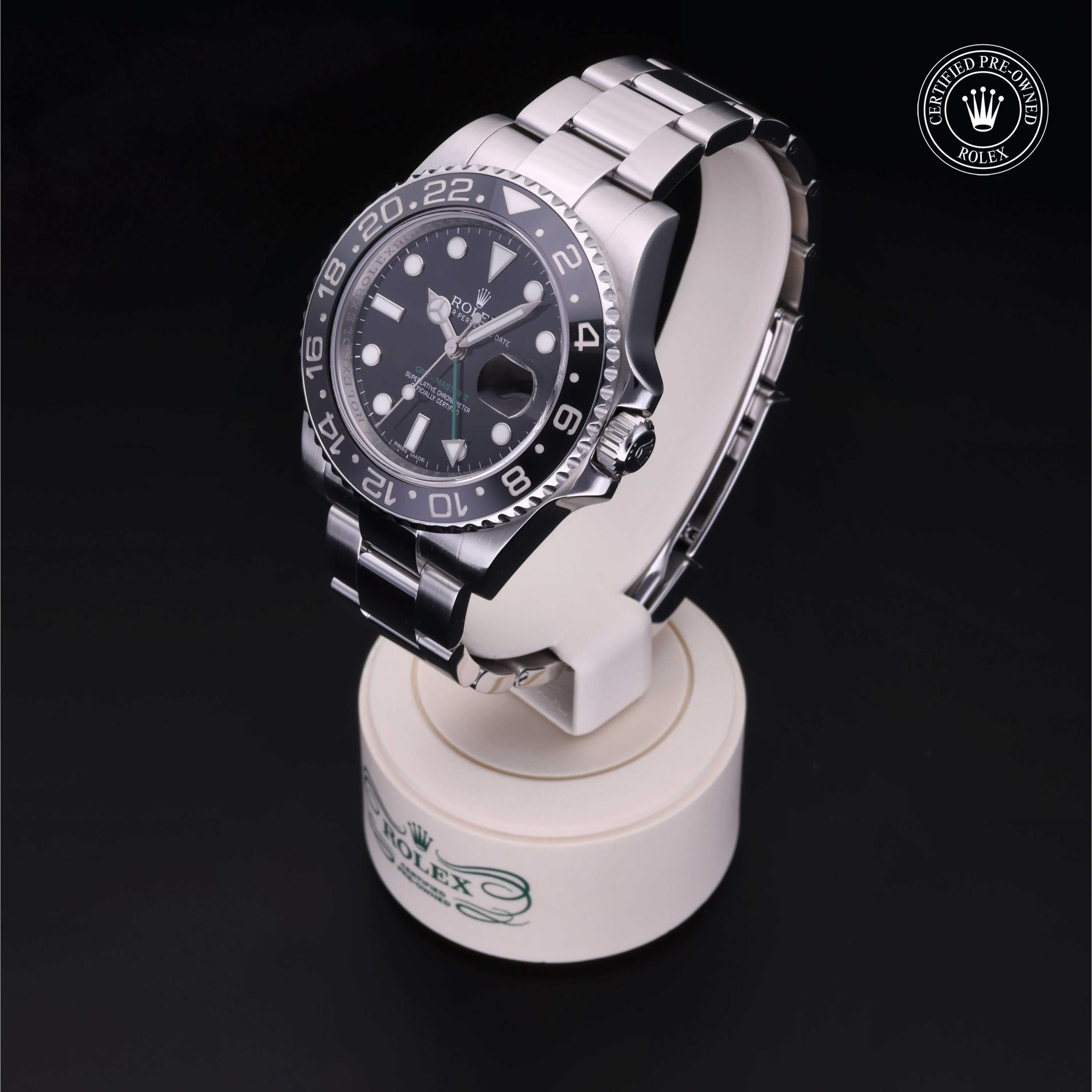 Rolex Certified Pre-owned GMT M116710LN-0001 front on black background