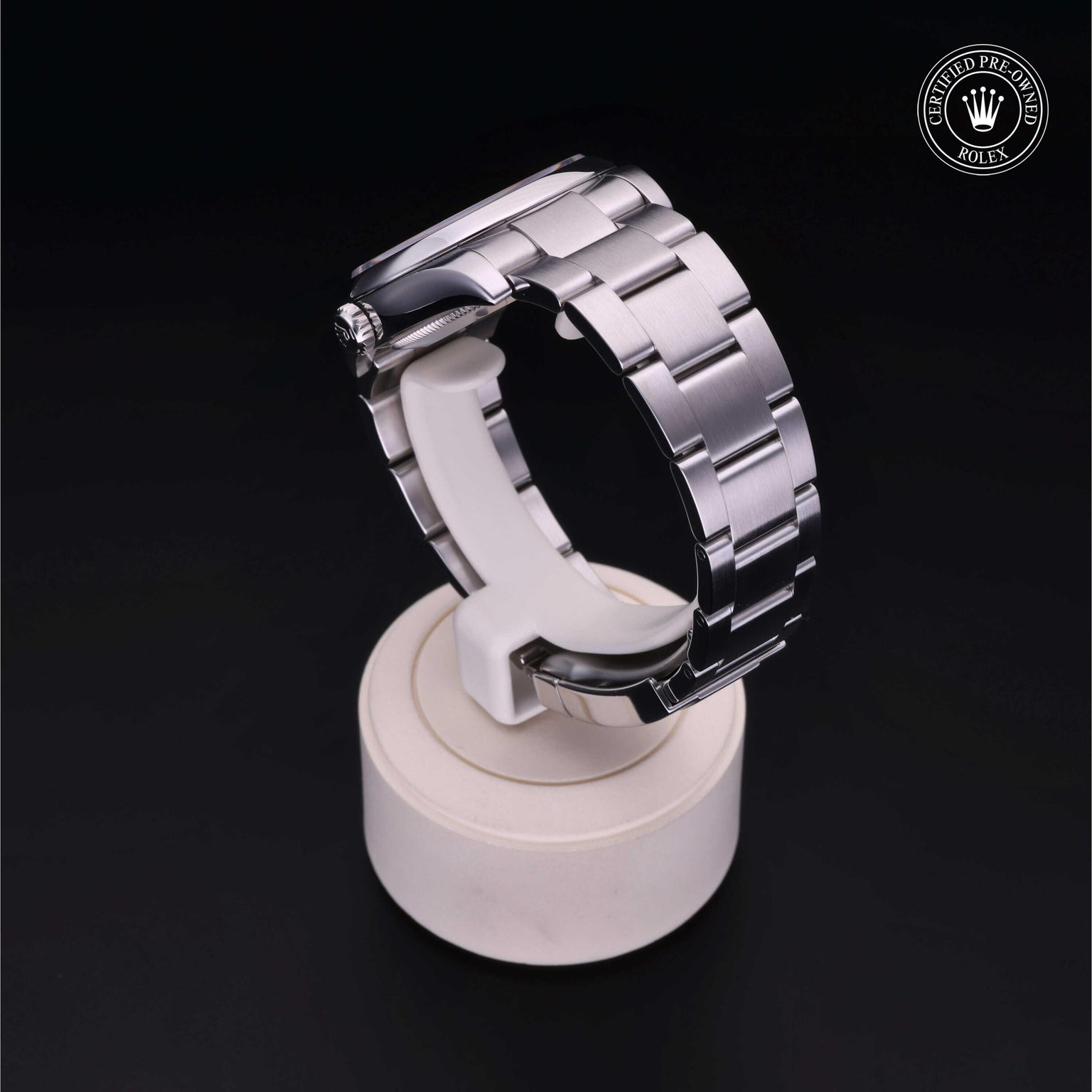 Rolex Certified Pre-owned Oyster Perpetual M116000-0006 front on black background