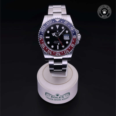 Rolex Certified Pre-owned GMT M126710BLRO-0002 front on black background