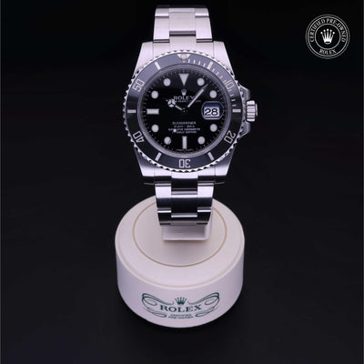 Rolex Certified Pre-owned Submariner M116610LN-0001 front on black background