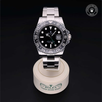 Rolex Certified Pre-owned GMT II M116710LN-0001 front on black background