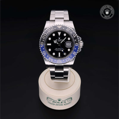 Rolex Certified Pre-owned GMT II M116710BLNR-0002 front on black background