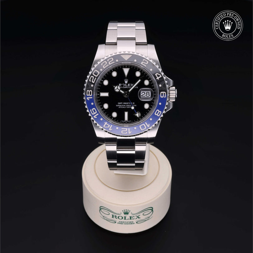 Rolex Certified Pre-owned GMT II M116710BLNR-0002 front on black background