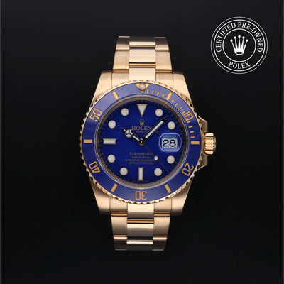 Rolex Certified Pre-owned Submariner M116618LB-0001 front on black background