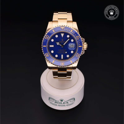 Rolex Certified Pre-owned Submariner M116618LB-0001 front on black background