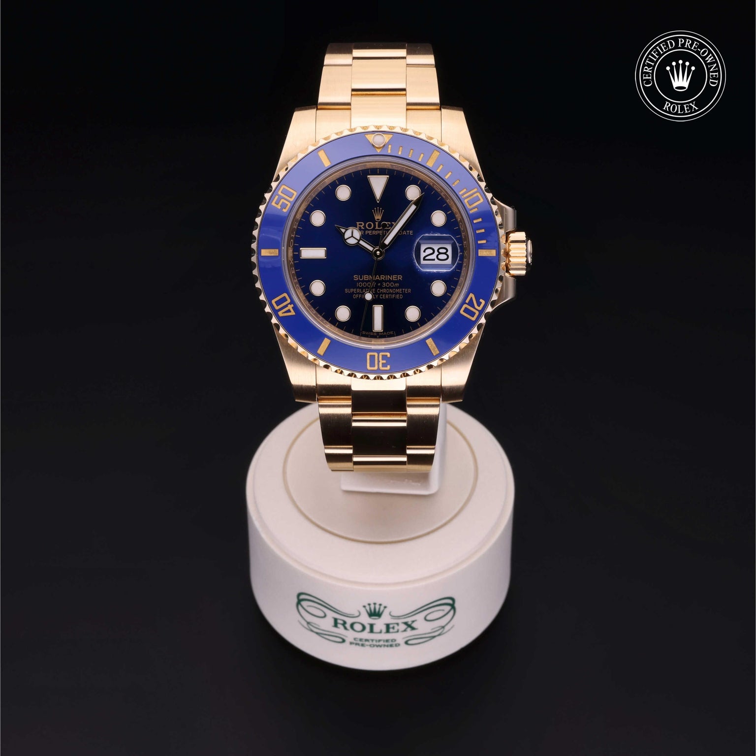 Rolex Certified Pre-owned Submariner M116618LB-0003 front on black background