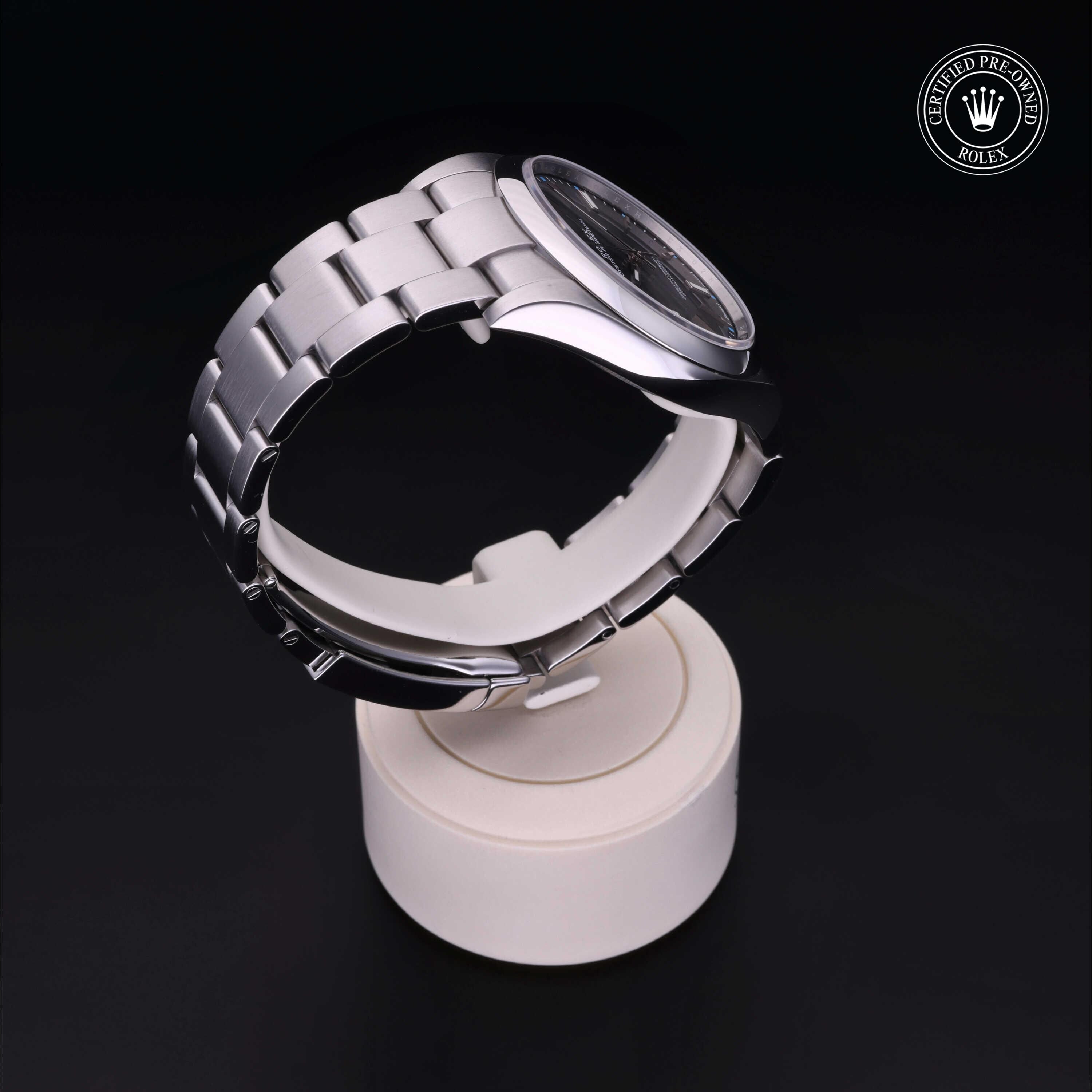 Rolex Certified Pre-owned Oyster Perpetual M114300-0001 front on black background